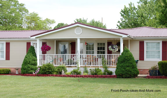 Ever so charming ranch home with welcoming front porch.