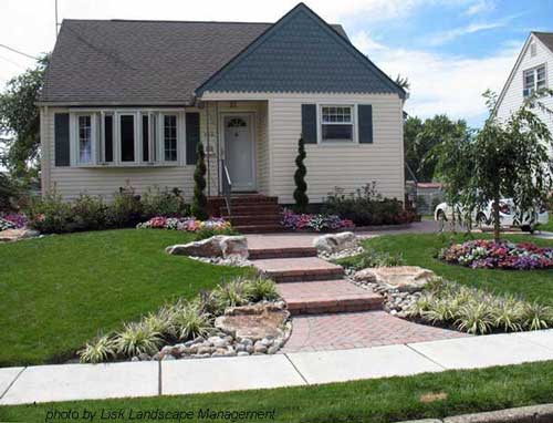 evergreen landscape ideas Front Yard Landscape Design | 500 x 382