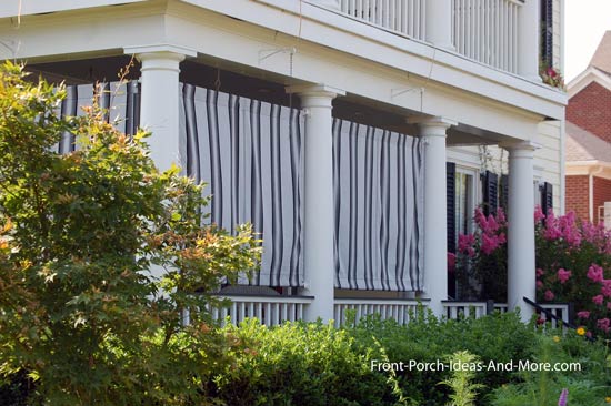 striped outdoor curtains on front porch