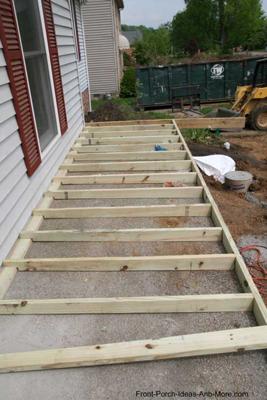sleepers construced over top of concrete for front porch