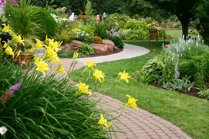 colorfully landscaped brick and concrete combination walkway