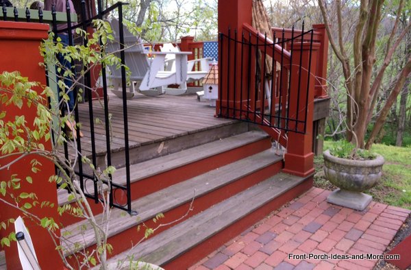 wrought-iron gates on porch steps