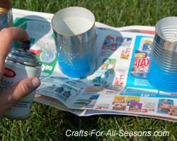 paint the luminaries with blue spray paint