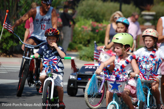 iconic 4th of july parade with kids on bikes