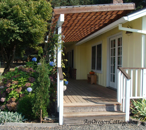 front of Jami and Brian's ranch home with an extended porch