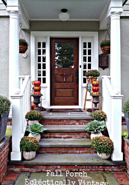 sophisticatedly decorated front porch for fall