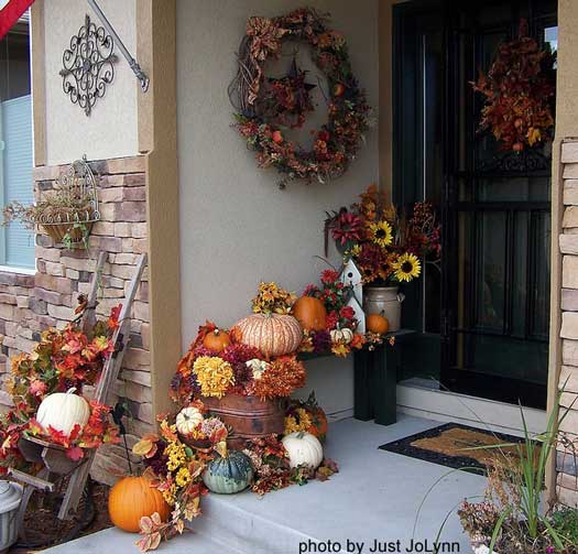 An exquisitely decorated front porch for fall
