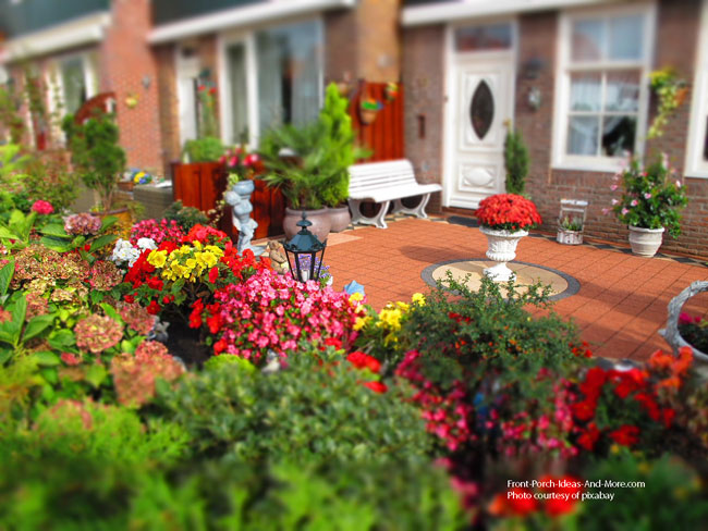 backyard patio idea surrounded by flowers