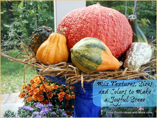 closeup of aurumn harvest in repurposed bird bath