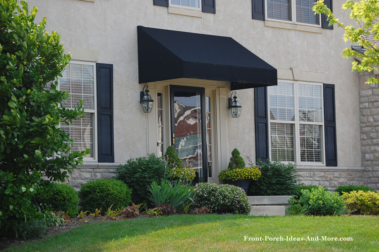 Black porch awnings over front door