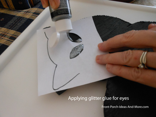 apply the eyes with glitter glue