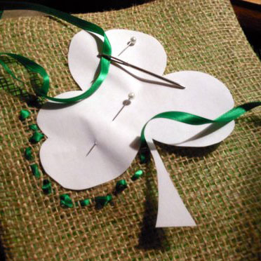 shamrocks painted on pillows for front porch