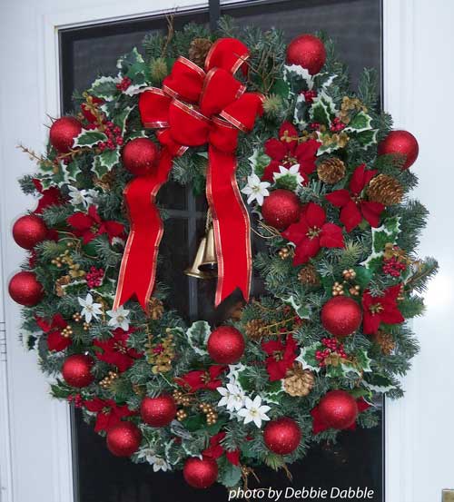 delightful and colorful Christmas wreath on front door