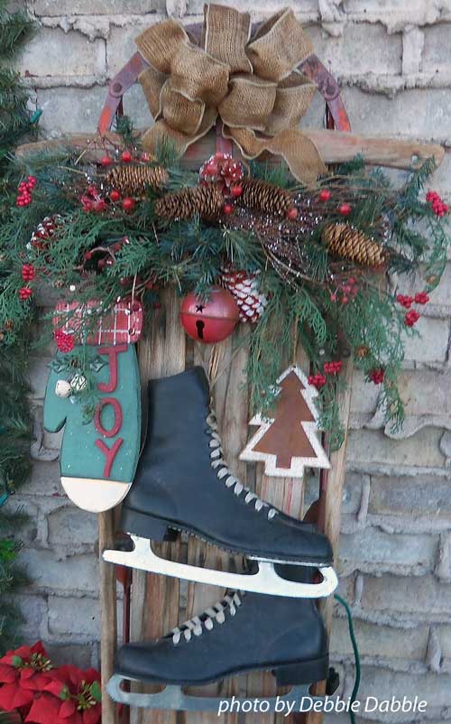 sled and skates as a christmas door decoration