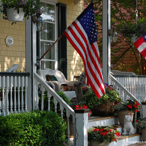 front porch with American flag