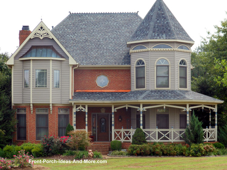contemporary Victorian home with turret front porch