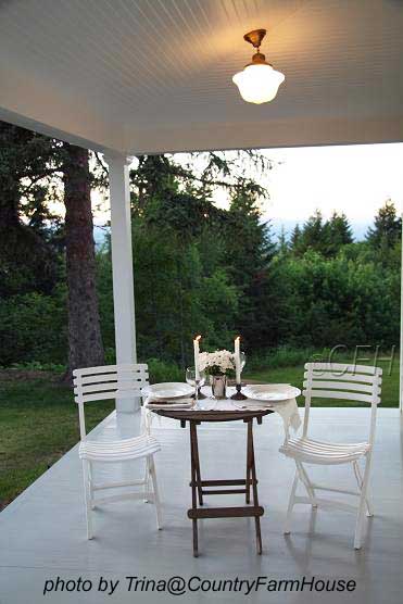 bistro table and chairs on country porch
