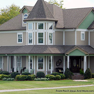 large contemporary wrap around country front porch