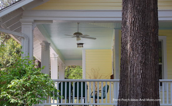outdoor fan on wrap around porch with haint blue ceiling