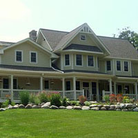 craftsman style farmhouse with wrap around front porch