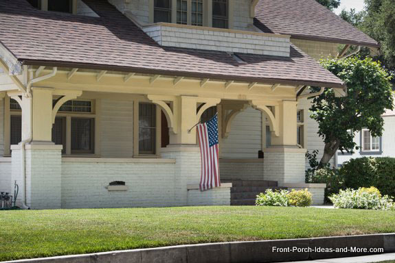 craftsman style front porch with wide tapered columns