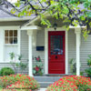 front porch with vivid red door
