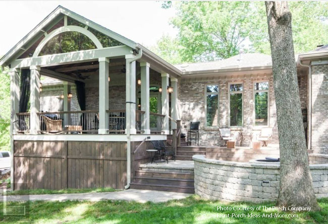 amazing upper level deck and patio area with built in fire pit