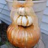 pumpkin decorating ideas: stacked and decorated pumpkins