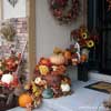 an autumn decorated porch