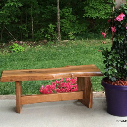 beautiful cherry garden bench on front porch