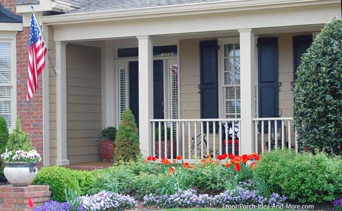 curb appealing front porch with colorful landscaping