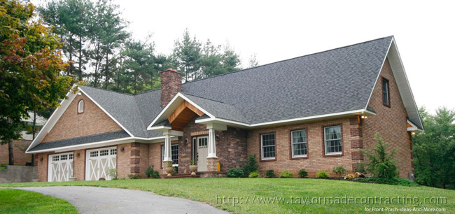 restored home with gabled portico