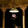 chandelier over bistro table on front porch