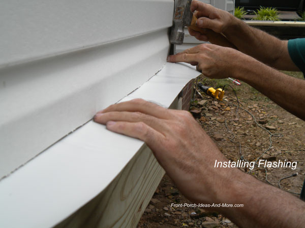 Installing ledger flashing is a critical step in porch and deck constructio...