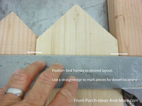 marking dowel locations using a straightedge to align and mark pieces of wood