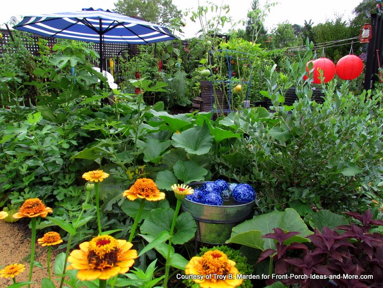 mix of vegetables, flowers and ornamentals on this front porch