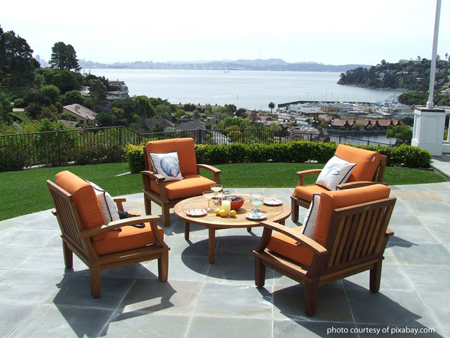 patio with outdoor furniture overlooking landscape