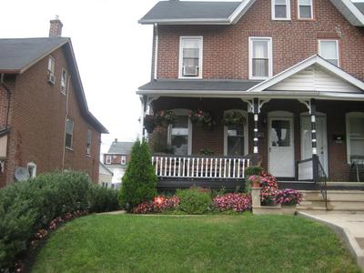 Northeastern porch of a twin brick home
