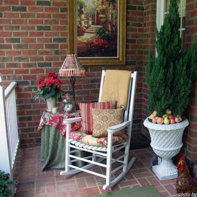 wall art hanging on front porch wall