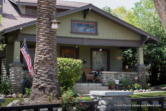 classic craftsman porch with tapered stone pedestals