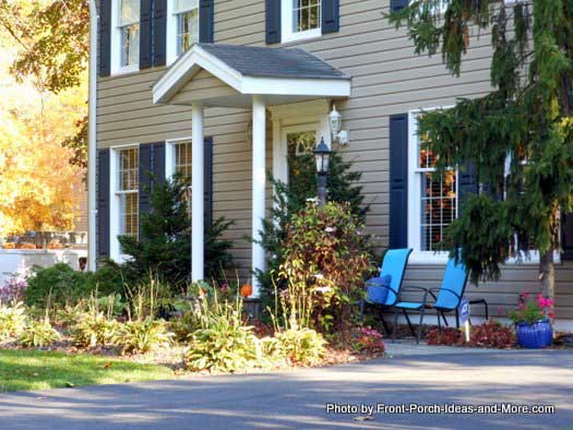 wide sidewalk to porch allows for extra seating