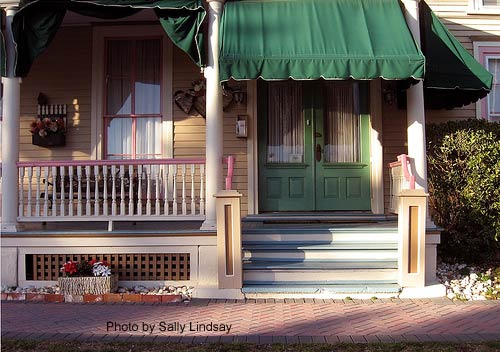 Beautiful porch awnings on Victorian home