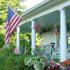 American flag flying from front porch