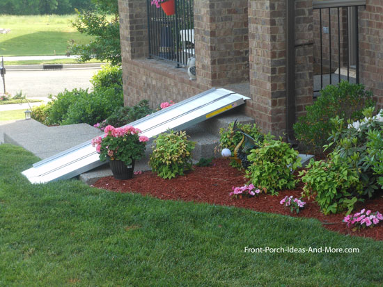 portable aluminum wheelchair ramp leading to front porch