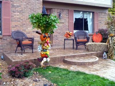 extravagant hair piece on pumpkin totem pole