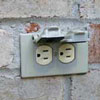 receptacle on brick wall