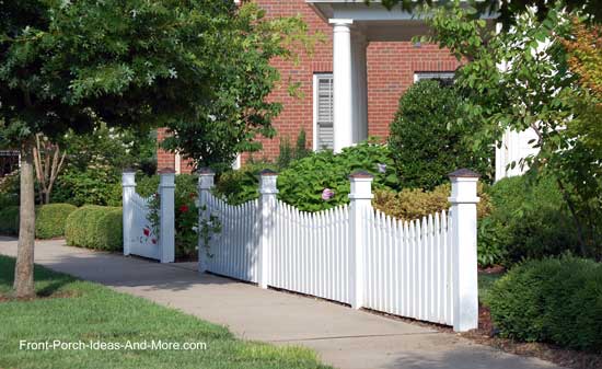 scalloped fence design as focal point for landscaping