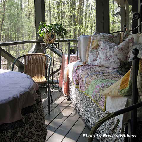comfortable bed on porch