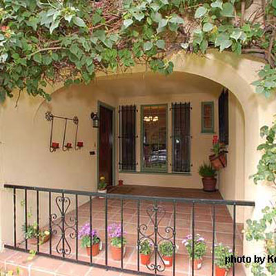 southwestern style stucco front porch