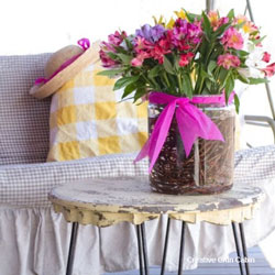 porch decorated for spring with flowers